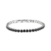 Silver bracelet with black stones on a white background