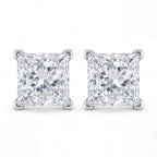 Pair of square-cut diamond stud earrings on a white background