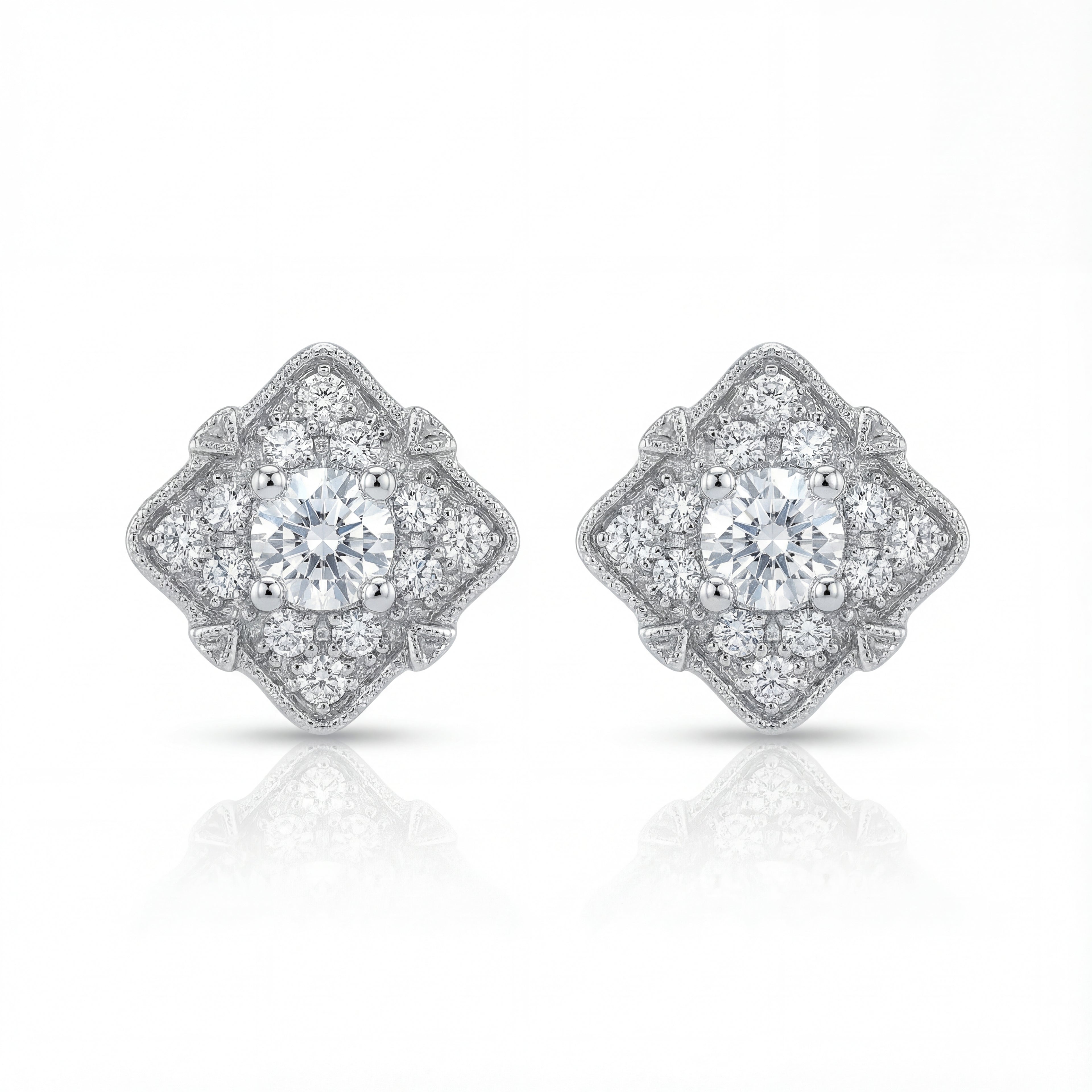 Pair of diamond earrings on a white background