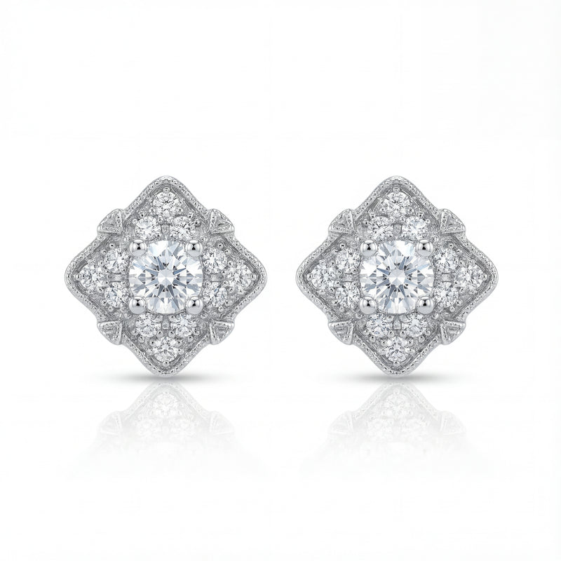 Pair of diamond earrings on a white background
