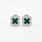 Pair of clover-shaped earrings with green centers and silver borders on a white background
