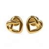 Pair of gold knot-shaped earrings on a white background