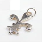 Silver fleur-de-lis pendant on a white background