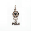 Silver pendant with soccer ball design and 'PELE' text on a white background