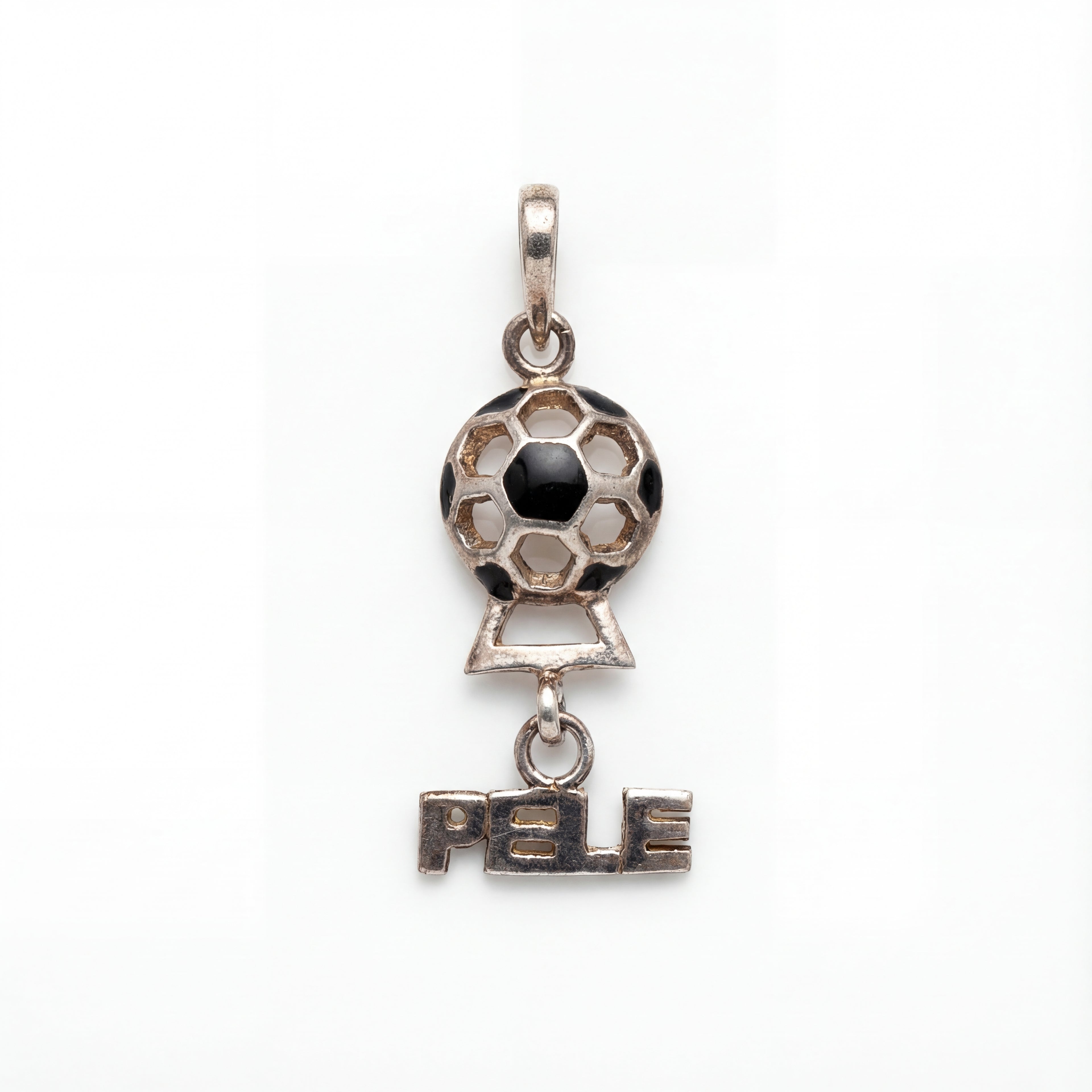 Silver pendant with soccer ball design and 'PELE' text on a white background
