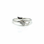 Silver ring with a small diamond on a white background